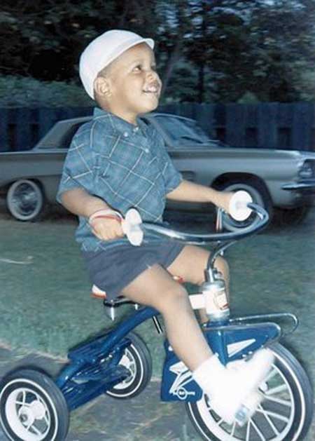President-Barack-Obama-as-a-child-riding-a-tricycle