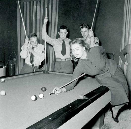 Sophia Loren playing pool, 1954.